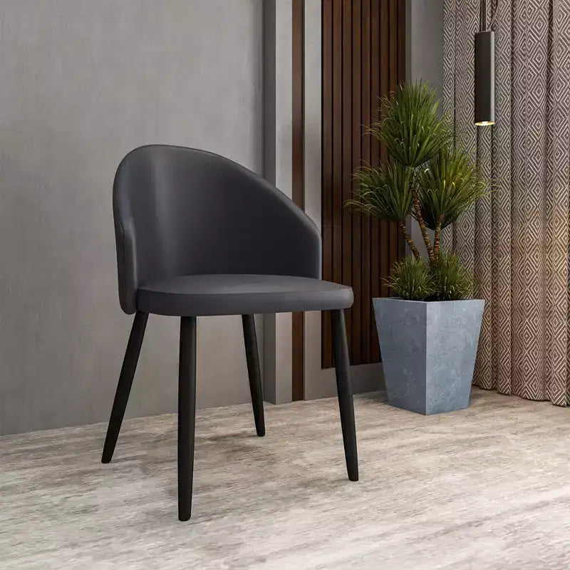 Modern Upholstered Dining Chair with Curved Back and Black Oak Legs