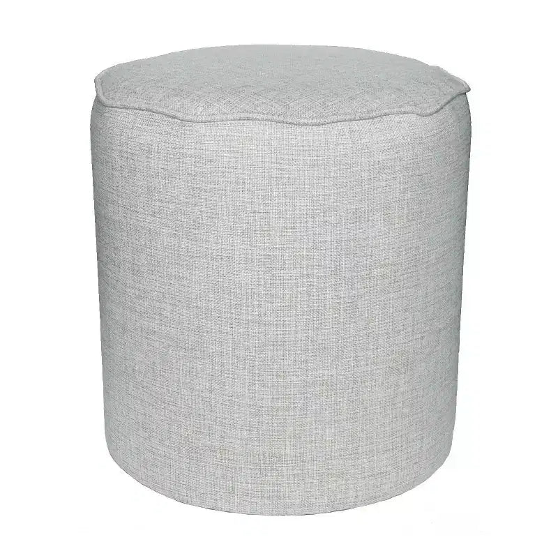 Round Scalloped Upholstered Ottoman